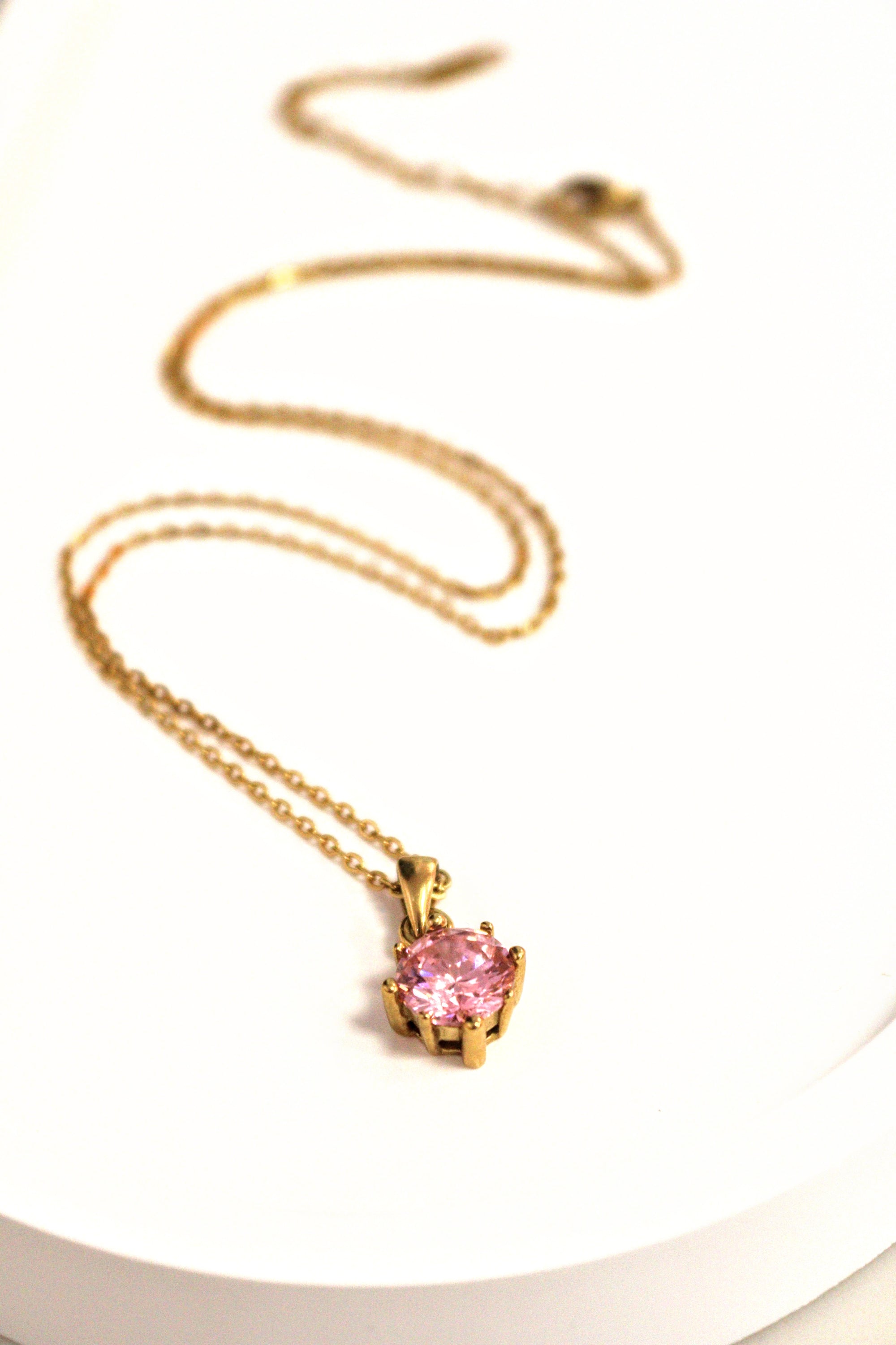 7. Emerald Hexagon Gold Necklace