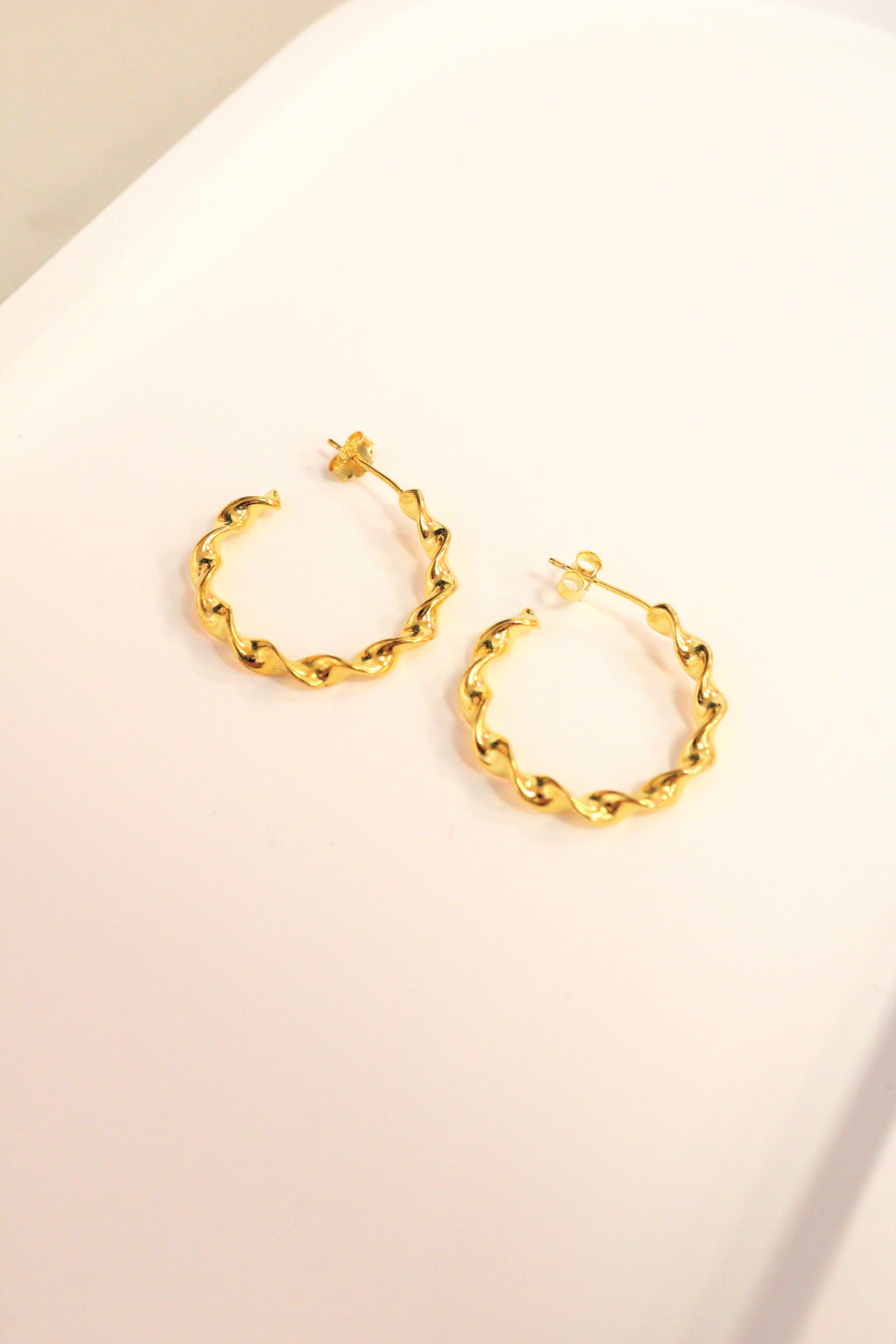 28. C Twist Earrings