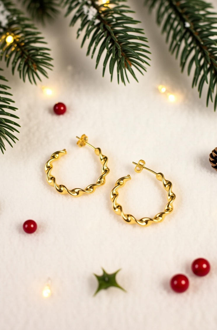 28. C Twist Earrings